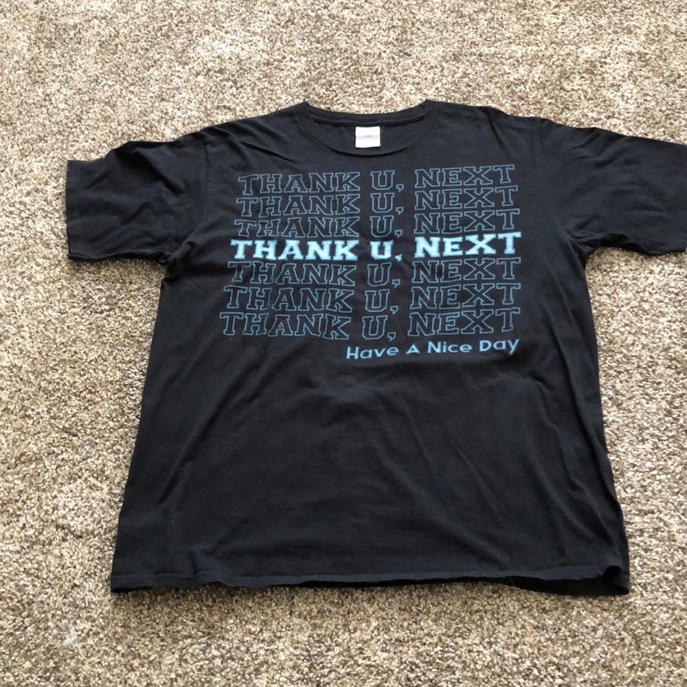 This is a black large size “Thank you next“ (Arianna Grande) shirt.